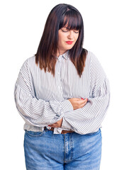 Sticker - Young plus size woman wearing casual clothes with hand on stomach because indigestion, painful illness feeling unwell. ache concept.