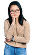 © Krakenimages.com - Young chinese woman wearing casual sweater and glasses thinking looking tired and bored with depression problems with crossed arms.