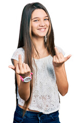 Canvas Print - Young brunette girl with long hair wearing white shirt showing middle finger doing fuck you bad expression, provocation and rude attitude. screaming excited