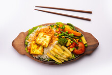Paneer Sizzler Is An Indian Version With Cottage Cheese, Salad Served Sizzling On Hot Stone Dish.
