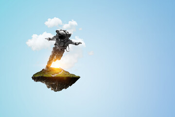 Wall Mural - spaceman on a light bulb