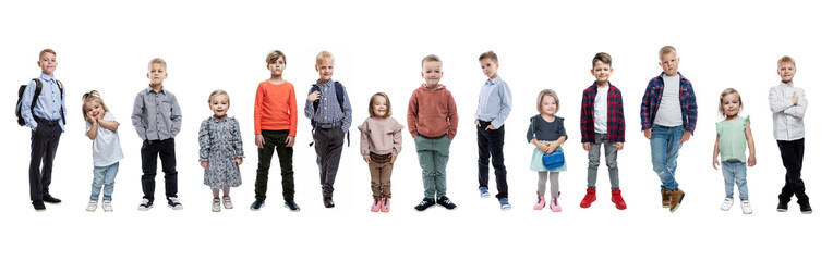 Lots of kids of all ages. Boys and girls. Isolated on white background. Full height. Panorama format. Set, collage.