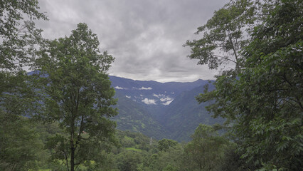 Clouds over the Mountains in Deep Himalayan Forest