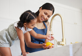 Poster - Cleaning, mother and child washing vegetables with water for lunch, nutrition or breakfast in the kitchen of their house. Child learning to clean food while cooking with her mom before dinner