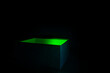 black box with green light