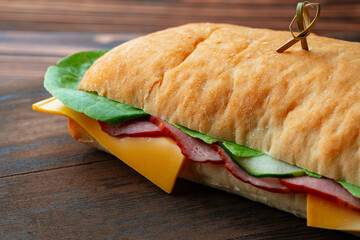 Wall Mural - Ham sandwich with cheese and lettuce on table