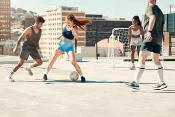 Canvas Print - Soccer, rooftop and friends happy activity bonding together with sport workout training in city. Diversity, sports and men and women, football competition exercise and healthy lifestyle motivation