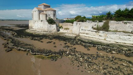 Wall Mural - Aerial shot of the Sainte Radegonde chapel in the Talmont village in Gironde, France