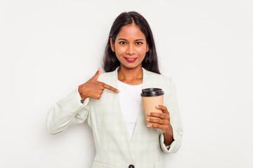 Wall Mural - Young business Indian woman holding takeaway coffee isolated on white background person pointing by hand to a shirt copy space, proud and confident