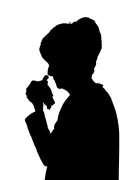Profile portrait silhouette of sad elderly lady crying or sick