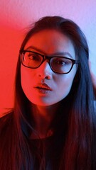 Wall Mural - Young and pretty Asian - portrait shot in RGB colors - videoclip