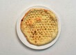 © Food Shop - simple naan or sada naan served in a dish isolated on grey background top view of indian, pakistani food