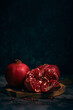juicy pomegranate on a dark background