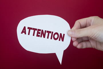 Poster - Speech bubble in front of colored background with Attention text.