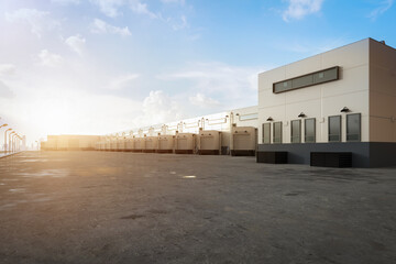 Warehouse exterior with shutter doors and truck parking lots