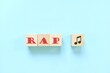 © sulit.photos - Rap music genre or style concept. Creative flat lay typography composition in blue background.