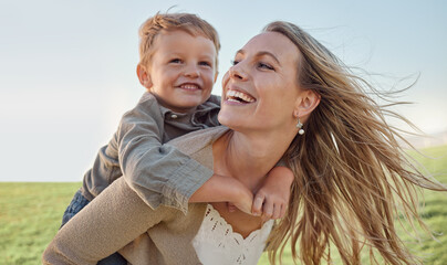 mother, child and happy piggyback in summer, holiday and blue sky, sunshine and play in a green park