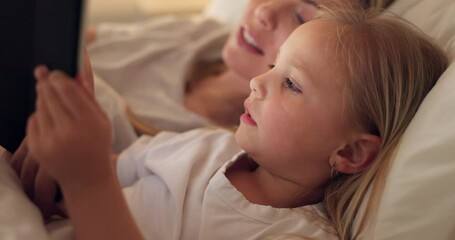 Wall Mural - Tablet, mother and child on the internet in bed, streaming a movie or reading a book on the web at night. Education, learning and games on technology for a girl and her mom together in the bedroom