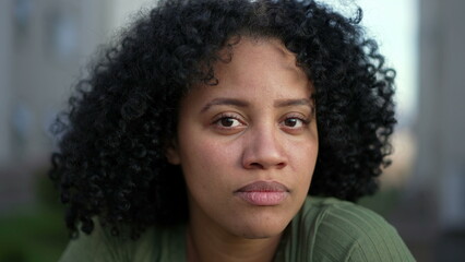 portrait face of a young black woman looking at camera. a hispanic south american brazilian adult gi