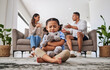 © Beaunitta V W/peopleimages.com - Parents, fighting and sad girl in living room with teddy bear for support or comfort. Family, divorce and husband in argument with wife and scared kid sitting in fear, stress or depression on carpet