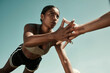 © Allistair/peopleimages.com - Teamwork, fitness and high five doing exercise in city, holding hands with workout partner. Health, support and black woman exercising with friend. Training, motivation and collaboration in sports