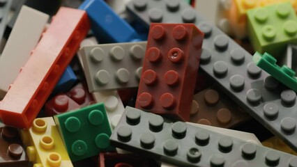 Poster - plastic colored parts of the designer rotate in a circle