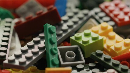 Poster - plastic colored parts of the designer rotate in a circle