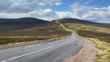 Wall Mural - Amazing road in Cairnwell Pass  in the Scottish Highlands, Scotland.Cairnwell Pass is located on the A93 road between Blairgowrie and Braemar.
