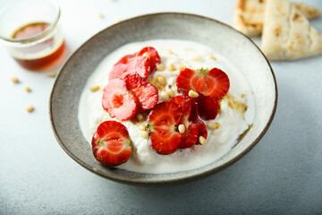 Wall Mural - Greek yogurt with strawberry and honey