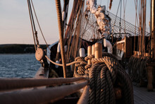 Closeup Of Ropes Of An Old Sailing Vessel With The Bowsprit In Background