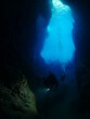 © underocean - caves underwater cave dive blue background scuba divers to explore
