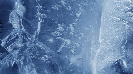 Poster - texture of blue ice with cracks in motion