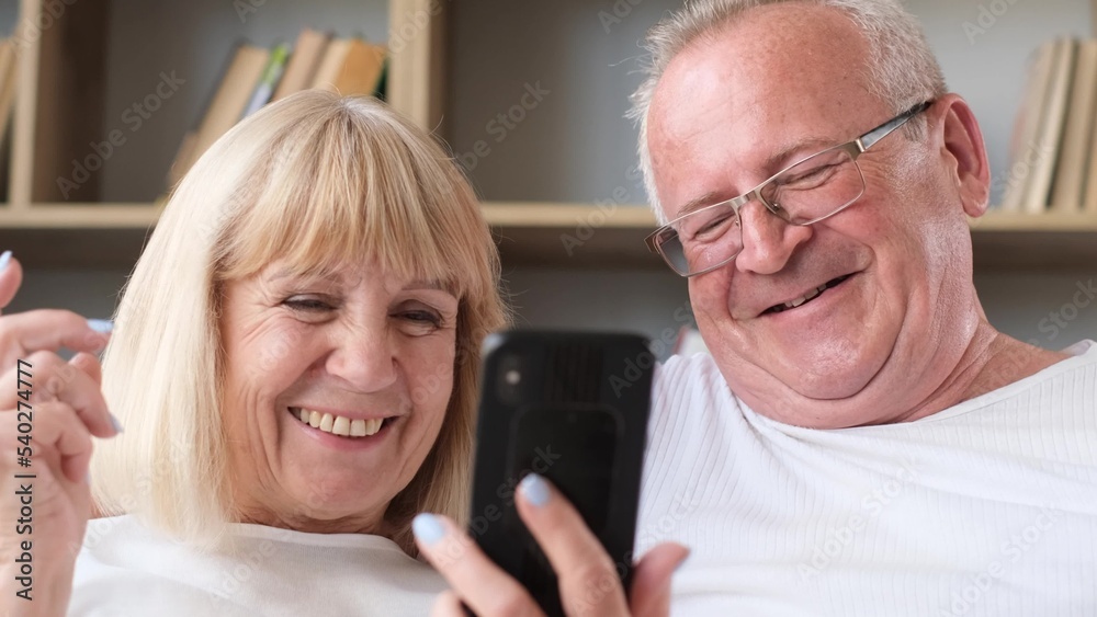Happy family of senior couple having fun taking selfie photo together ...