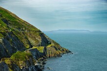 Beautiful Rocky Green Cliffs Over The Water Near Bray And Greystones In Ireland