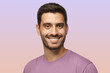 © Damir Khabirov - Smiling attractive man in t-shirt isolated on purple background