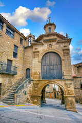 Wall Mural - Portal de Orta and Chapel of San Antonio in the town of Calaceite, Teruel. Spain.