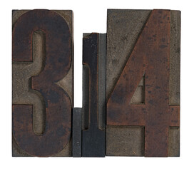 Isolated antique wood block type in reverse spelling 3.14 for pi day