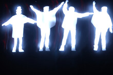 Silhouette Of People Dancing Beatles