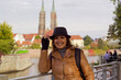 portrait of a happy woman in wroclaw city, poland	