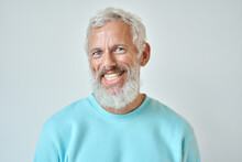 Happy Mature Old Bearded Man With Dental Smile, Cool Mid Aged Gray Haired Older Senior Hipster Wearing Blue Sweatshirt Standing Isolated On White Background Looking At Camera, Headshot Portrait.
