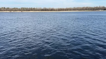 Wall Mural - flowing river water rippled surface.