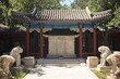 Garden with carved stone artwork of bixis in Zhenjue Temple of Beijing, China