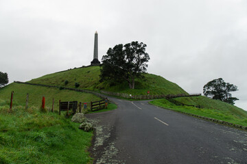 Wall Mural - Curved road into the obelisk at One Tree Hill, Auckland, New Zealand.