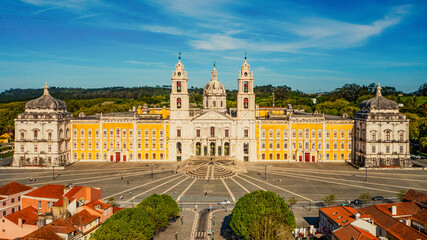 Aerial view of the Palace of Mafra. Unesco world heritage in Portugal. Aerial top view of the Royal Convent and Palace of Mafra, baroque and neoclassical palace. Drone view of a historic castle.