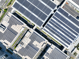 Wall Mural - solar panels on factory rooftop