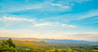 © aFotostock - Dramatic sunset over mountain landscape. Beautiful landscape foggy hills twilight time. Blue golden sky sunrise dramatic beautiful landscape mountain. Dawn sky gold dusk time cloudscape with sunlight