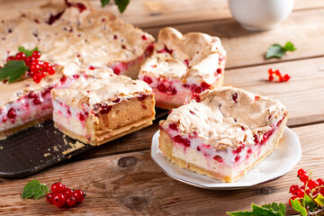 Wall Mural - Redcurrant cheesecake, tart with fresh berries on wooden table