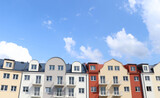 Fototapeta Londyn - Beautiful view of modern houses against blue sky