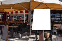 Beautiful Straw Beach Umbrellas In Modern Outdoors Cafe