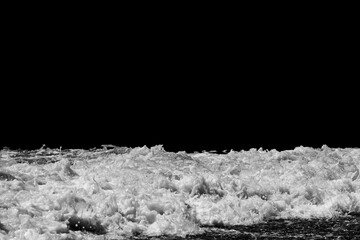 Poster - sea wave with foam isolated on black background
